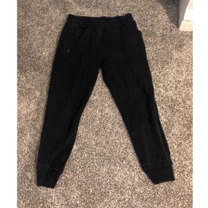 Under Armour black sweatpants in a size medium